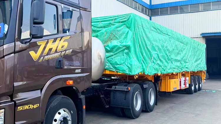 Cami&oacute;n con plataforma de 3 ejes en venta en Zambia