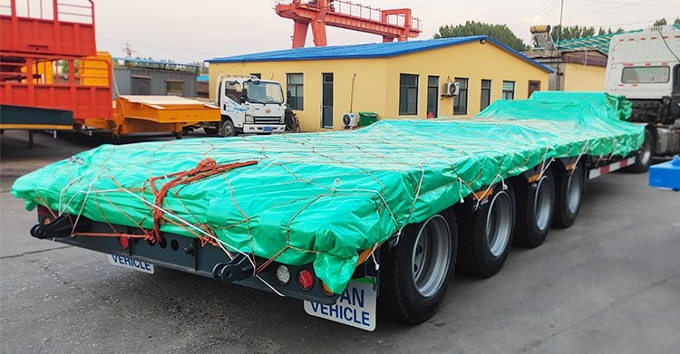 Remolque hidráulico de plataforma baja de 4 ejes a la venta en Nigeria
