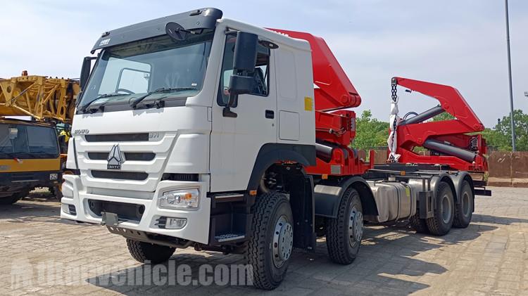 Camión portacontenedores de 20 pies con carga lateral en venta en Chile