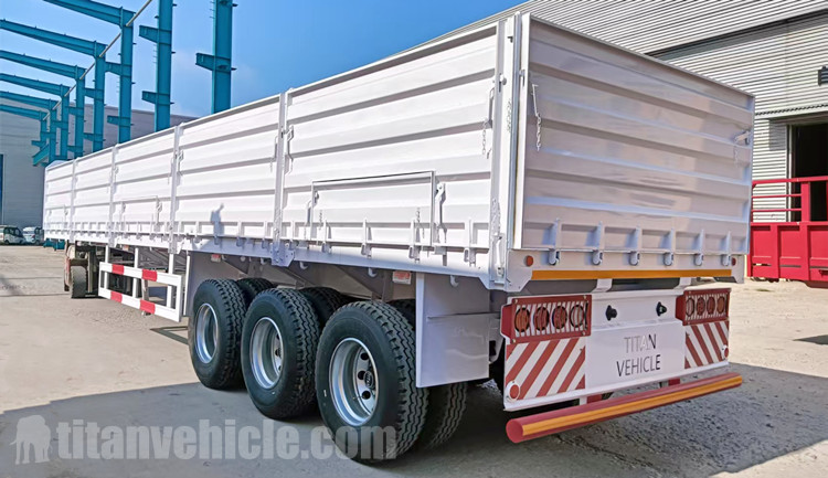 Remolque de tres ejes con pared lateral en venta en Zimbabue