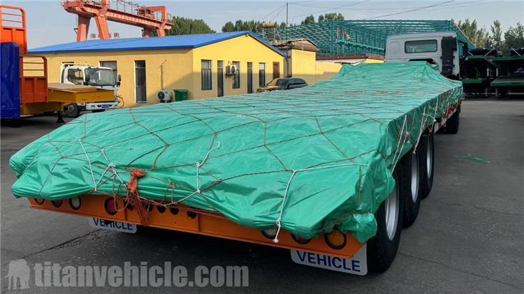 Remolque de plataforma baja de tres ejes y 60 tonos a la venta en Indonesia