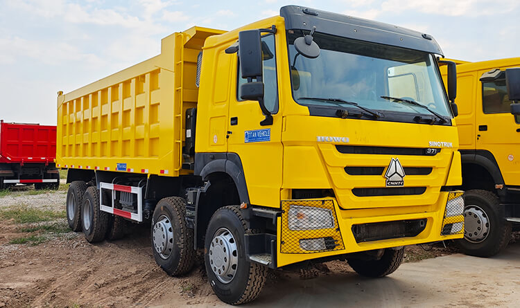 Vídeo de camión volquete usado y económico de Howo Howo Cheap Used Dump Truck  Camión volquete Howo 8x4 Precio: 21110 USD Además de la inspección y reparación integral de las piezas importantes, se reemplazará el motor y la transmisión de este camión volquete barato usado Howo 8x4 en venta cerca de mí en Nigeria por unos nuevos para garantizar la potencia de salida y la estabilidad del rendimiento del camión. El nuevo motor puede proporcionar una gran potencia y adaptarse a diversas condiciones de trabajo complejas, mientras que la nueva transmisión garantiza la suavidad y la velocidad de respuesta del cambio de marcha, lo que hace que la experiencia de conducción sea más cómoda y satisface así las necesidades de los clientes de un transporte eficiente.  Además de la limpieza profesional, la carrocería de este camión volquete usado barato Howo 8x4 en venta cerca de mí en Nigeria también se lijará y pintará nuevamente para garantizar la apariencia nueva del camión y la vida útil del mismo. La carrocería tratada con cuidado no solo mejora la apariencia y la hace lucir como nueva, sino que también extiende la vida útil del camión.  Este camión volquete usado y barato Howo 8x4 a la venta cerca de mí en Nigeria tiene un modo de conducción 8x4, que puede proporcionar una buena capacidad de carga y estabilidad para el transporte de carga pesada. Y mantiene un buen manejo y estabilidad de conducción en entornos de obras de construcción complejos.  Howo 8x4 Cheap Used Dump Trucks for Sale Near Me in Nigeria  Camiones volquete usados ​​y económicos Howo 8x4 ofertas de camiones  Howo 8x4 Cheap Used Dump Trucks for Sale Near Me in Nigeria  Camiones volquete usados ​​y económicos Howo 8x4 ofertas de camiones  Howo 8x4 Cheap Used Dump Trucks for Sale Near Me in Nigeria  Camiones volquete usados ​​y económicos Howo 8x4 ofertas de camiones  Howo 8x4 Cheap Used Dump Trucks for Sale Near Me in Nigeria  Camiones volquete usados ​​y económicos Howo 8x4 ofertas de camiones  Howo 8x4 Cheap Used Dump Trucks for Sale Near Me in Nigeria  Camiones volquete usados ​​y económicos Howo 8x4 ofertas de camiones  Howo 8x4 Cheap Used Dump Trucks for Sale Near Me in Nigeria  Camiones volquete usados ​​y económicos Howo 8x4 ofertas de camiones  Howo 8x4 Cheap Used Dump Trucks for Sale Near Me in Nigeria  Camiones volquete usados ​​y económicos Howo 8x4 ofertas de camiones  Ventajas del camión volquete usado y económico de Howo 1. Este camión volquete usado y barato Howo 8x4 a la venta cerca de mí en Nigeria tiene una estructura de carrocería resistente, ideal para el transporte pesado. La carrocería está hecha de acero de alta resistencia y ha sido sometida a un riguroso proceso de tratamiento para garantizar su durabilidad y estabilidad bajo cargas pesadas y entornos de trabajo hostiles. Ya sea en sitios de construcción, áreas mineras u otros escenarios de transporte complejos, la carrocería puede brindar un soporte confiable para resistir el impacto externo y el desgaste, y extender la vida útil del camión.  2. Este camión volquete usado barato howo 8x4 a la venta cerca de mí en Nigeria tiene un espacio espacioso, por lo que el conductor no se sentirá oprimido al conducir durante mucho tiempo. El asiento está hecho de materiales de alta calidad y tiene un diseño ergonómico, que puede reducir eficazmente la fatiga causada por la conducción prolongada. La cabina está equipada con un tablero multifunción, que puede monitorear fácilmente los diversos indicadores de rendimiento del vehículo. El diseño del parabrisas delantero y las ventanas laterales con un amplio campo de visión garantiza que el conductor pueda observar claramente el entorno circundante, mejorar la seguridad de conducción y reducir los riesgos causados ​​por los puntos ciegos.  3. Este camión volquete usado y barato Howo 8x4 a la venta cerca de mí en Nigeria está equipado con un tanque de combustible de gran capacidad para satisfacer las necesidades de transporte de larga distancia. El diseño de tanque de combustible grande no solo reduce la frecuencia de reabastecimiento de combustible, sino que también mejora la eficiencia del trabajo, especialmente cuando se trabaja en áreas remotas, el conductor puede concentrarse en el trabajo durante más tiempo sin tener que detenerse con frecuencia para reabastecerse. Este diseño hace que el vehículo funcione bien en el transporte de larga distancia y las operaciones de carga pesada, lo que mejora enormemente la economía.  4. Este camión volquete usado y barato de 8x4 de Howo en venta cerca de mí en Nigeria está equipado con neumáticos profesionales de alta resistencia para garantizar un excelente agarre y estabilidad en diversas condiciones de la carretera. Estos neumáticos están especialmente diseñados para soportar cargas elevadas y adaptarse a entornos complejos de obras de construcción, lo que mejora la seguridad y la fiabilidad de la conducción. Ya sea en caminos fangosos, terrenos arenosos y de grava o pendientes pronunciadas, este camión volquete puede mantener una buena capacidad de control para garantizar la finalización sin problemas de las tareas de transporte.  5. Este camión volquete usado barato de 8x4 de Howo en venta cerca de mí en Nigeria está equipado con cilindros hidráulicos de alta calidad. El sistema hidráulico responde y puede completar rápidamente las tareas de descarga, reducir el tiempo de espera y mejorar la eficiencia del trabajo. El diseño del cilindro hidráulico se ha calculado cuidadosamente para soportar alta presión para garantizar que sea estable y confiable bajo cargas pesadas. En general, este camión volquete ha tenido en cuenta las necesidades de los usuarios en el diseño y la configuración, brindando un excelente rendimiento y confiabilidad, lo que lo convierte en una opción ideal para los clientes en el campo del transporte pesado. Ya sea que transporte materiales de construcción, movimiento de tierras u otros productos pesados, este camión volquete HOWO 8x4 puede brindarles a los clientes una experiencia de transporte eficiente y económica.  Especificación del camión volquete usado económico de Howo Modelo: Camión volquete usado Howo 8x4   Tipo: 8x4  Cabina: HW76  Motor: WD615.47-371  Potencia: 371/420  Transmisión: HW19710+HW50PTO  Eje delantero: HF9  Eje trasero: HC16  Tanque de combustible: 400L  Neumático: 12R22.5  ¿Por qué elegir el camión usado TITAN VEHICLE?  USED HOWO TRUCK Gearbox   All New Parts Inside The Engine   Used Howo Truck Engine Of The Test Index Is Qualified   Motor estándar TITAN TITAN reemplazó el 90% de las piezas de motor de camión tractor howo usadas por otras nuevas y realizó una inspección integral del motor.  HOWO 6X4  Chasis estándar TITAN Para el chasis del camión howo usado, TITAN primero lo desmonta por completo, lo limpia con chorro de arena y elimina el óxido, luego le da una capa de pintura completa con pintura anticorrosión. TITAN ha reemplazado todos los demás accesorios del chasis del camión howo de segunda mano por otros nuevos.SITRA Howo camión tractor. mano.   TITAN Standard Chassis  Ejes estándar TITAN TITAN desmontará todos los ejes de cabeza de los camiones Howo usados ​​para inspeccionarlos y reemplazará todas las piezas internas defectuosas por otras nuevas. TITAN reemplazará todos los accesorios en el exterior del eje, incluidas las barras de dirección, las pastillas de freno y las cámaras de freno. Después de la renovación, TITAN limpiará con chorro de arena, eliminará el óxido del eje y rociará pintura anticorrosión en el eje. TITAN ofrece una garantía gratuita de un año para los camiones tractores Howo usados ​​en el motor, la caja de cambios y el eje. Para los neumáticos, TITAN ofrece una garantía de tres meses.SITRA Howo camión tractor.   TITAN Standard Axles   TITAN Standard Axles 