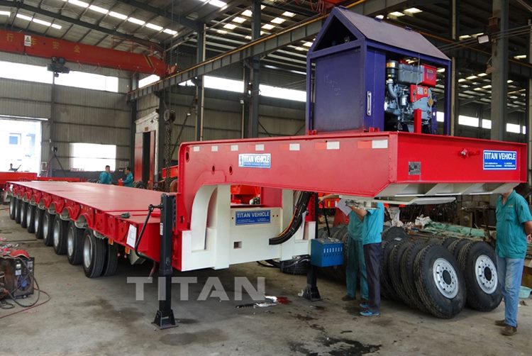 Remolque de plataforma baja con molino de viento extensible y elástico