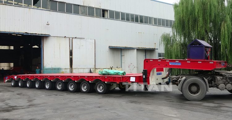Remolque de plataforma baja con molino de viento extensible y elástico